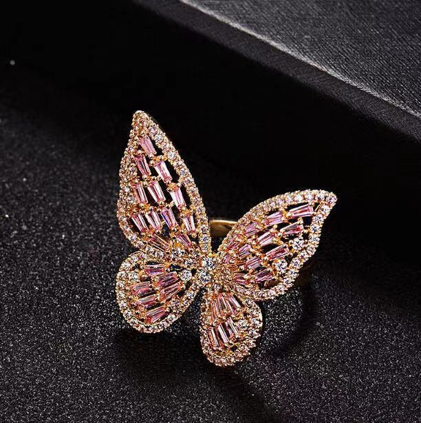 Trendy Dignified Fashion hollow butterfly ring with pink and gold accents, showcasing exquisite electroplated design.
