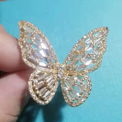 Dignified Fashion Hollow Butterfly Ring in gold with sparkling diamond accents, showcasing intricate design and adjustable size.